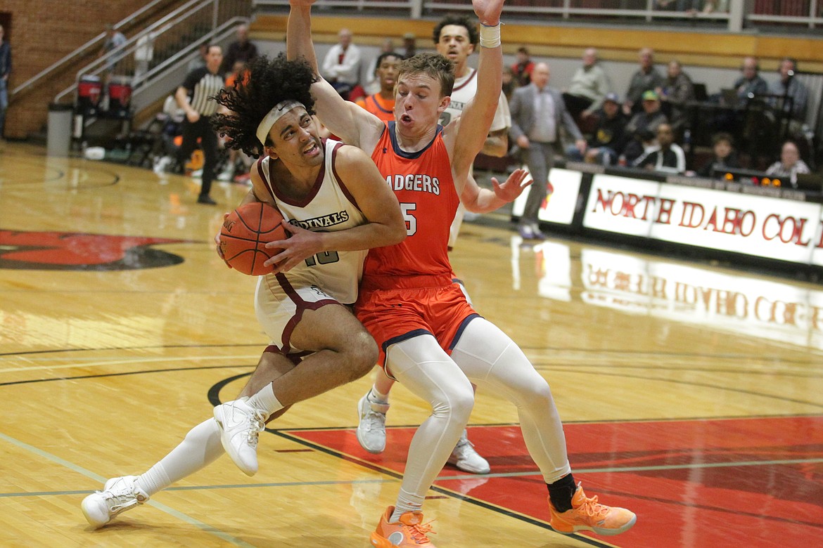 JASON ELLIOTT/Press
North Idaho College sophomore guard Tayshawn Colvin attempts to drive past Snow defender Chance Trujillo in the second half of Saturday's Scenic West Athletic Conference game against Snow at Rolly Williams Court.