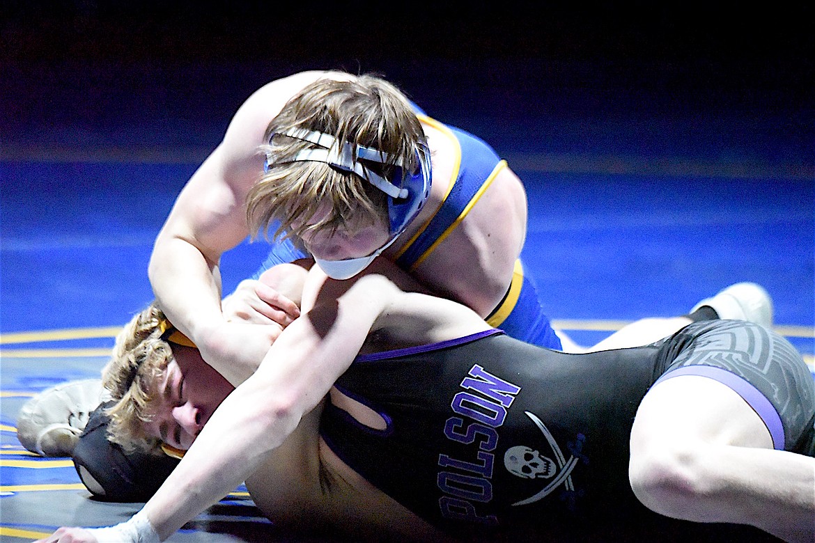 Libby Greenchain wrestler Boe Miles puts the hurt on Polson's Ryatt Maley in a 14-0 win Thursday, Jan. 30, 2025. (Scott Shindledecker/The Western News)