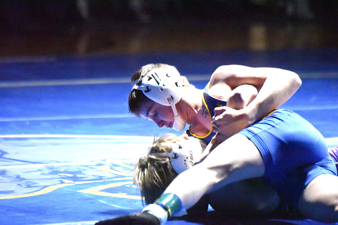 Libby Greenchain wrestler Riley Orr has Polson's Logan Clairmont nearly pinned Thursday, Jan. 30, 2025. Orr got the fall in 1:17. (Scott Shindledecker/The Western News)
