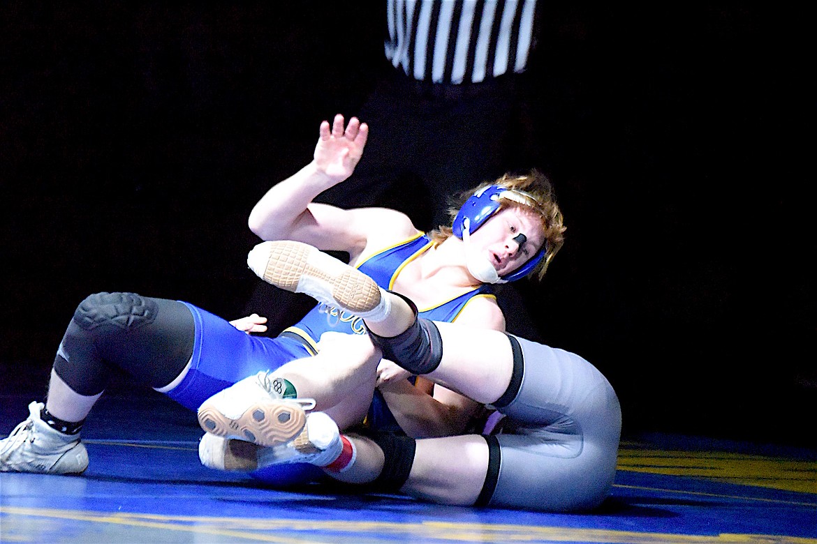 Libby Greenchain wrestler Tristan DeShazer battles Polson's Sheamis Cobb Thursday, Jan. 30, 2025. DeShazer got the fall in 22 seconds. (Scott Shindledecker/The Western News)