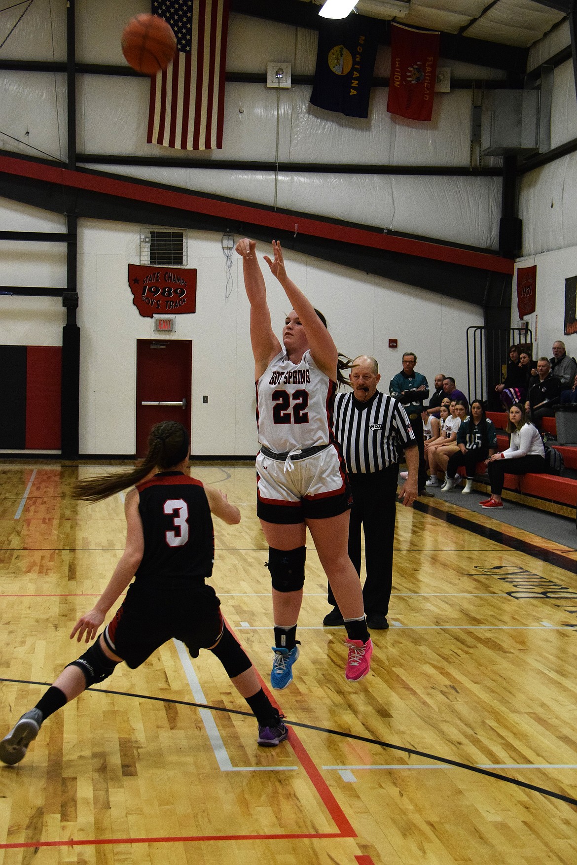 Lady Heat senior forward Brooke Jackson (22) shoots over a Flathead Valley Home School defender during their game this past week in Hot Springs.  (Photo by Jen Christensen)