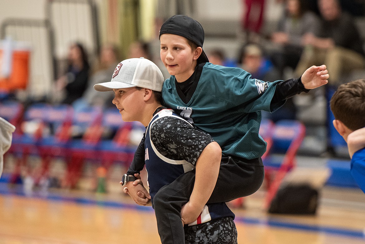 Bigfork Middle schoolers hit the court at halftime on Thursday, welcoming future basketball players to the program. (Avery Howe/Bigfork Eagle)