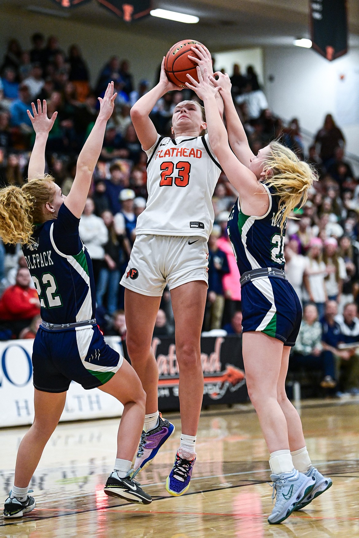 Flathead's Grace Gall (23) draws a foul in the fourth quarter against Glacier at Flathead High School on Thursday, Feb. 6. (Casey Kreider/Daily Inter Lake)