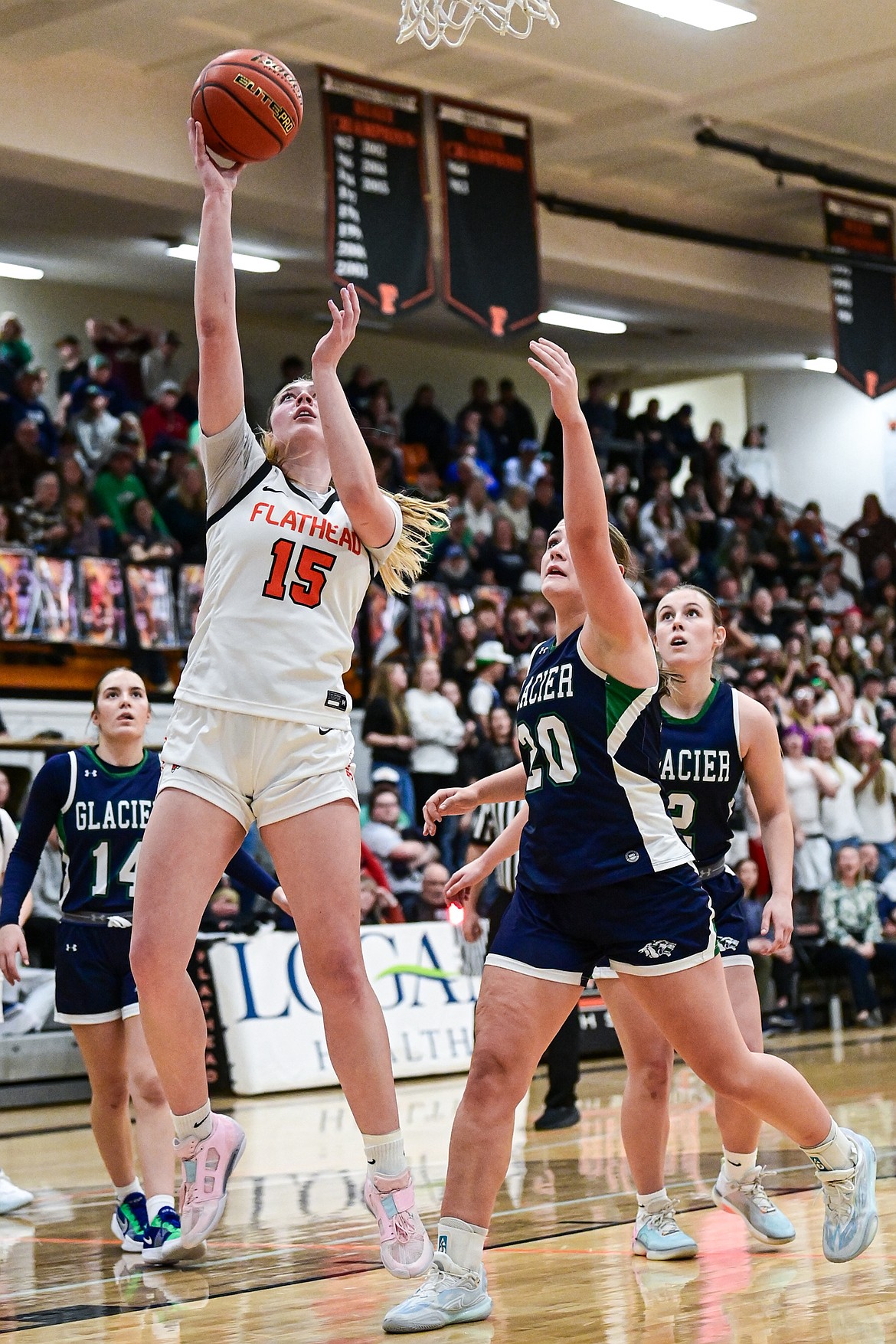 Flathead's Sami Dalager (15) goes to the hoop in overtime against Glacier at Flathead High School on Thursday, Feb. 6. (Casey Kreider/Daily Inter Lake)