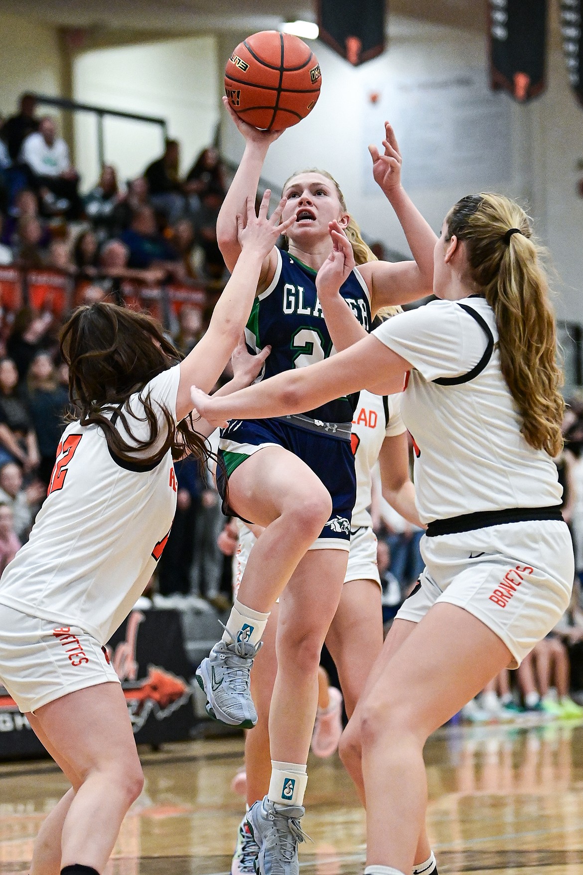Glacier's Cazz Rankosky (25) drives to the basket against Flathead at Flathead High School on Thursday, Feb. 6. (Casey Kreider/Daily Inter Lake)