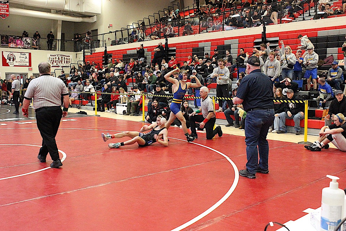 Libby Greenchain's Bridger Bache celebrates a win last weekend at the Western A Divisional boys wrestling tournament in Browning. (Photo courtesy Don Madison)