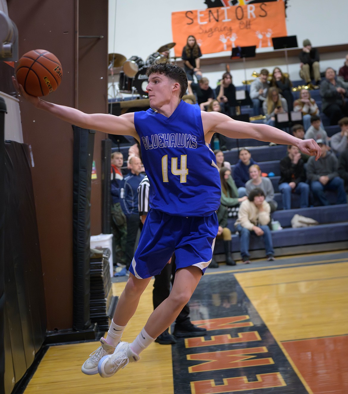 Blue Hawks Ethan Burgess tries to save a pass heading out of bounds during Thompson Falls' game in Plains versus the Horsemen last week.  (Tracy Scott, Valley Press)