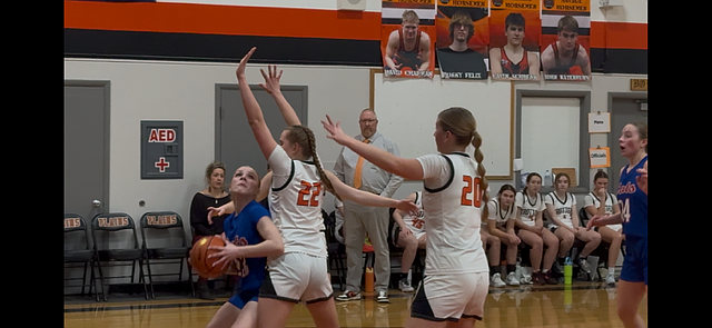 Superior guard Perri Jasper (with ball) looks to score against Trotters' Ava Lawyer (20) and Aubree Butcher (22) during their game this past week in Plains.  (Superior staff courtesy photo)