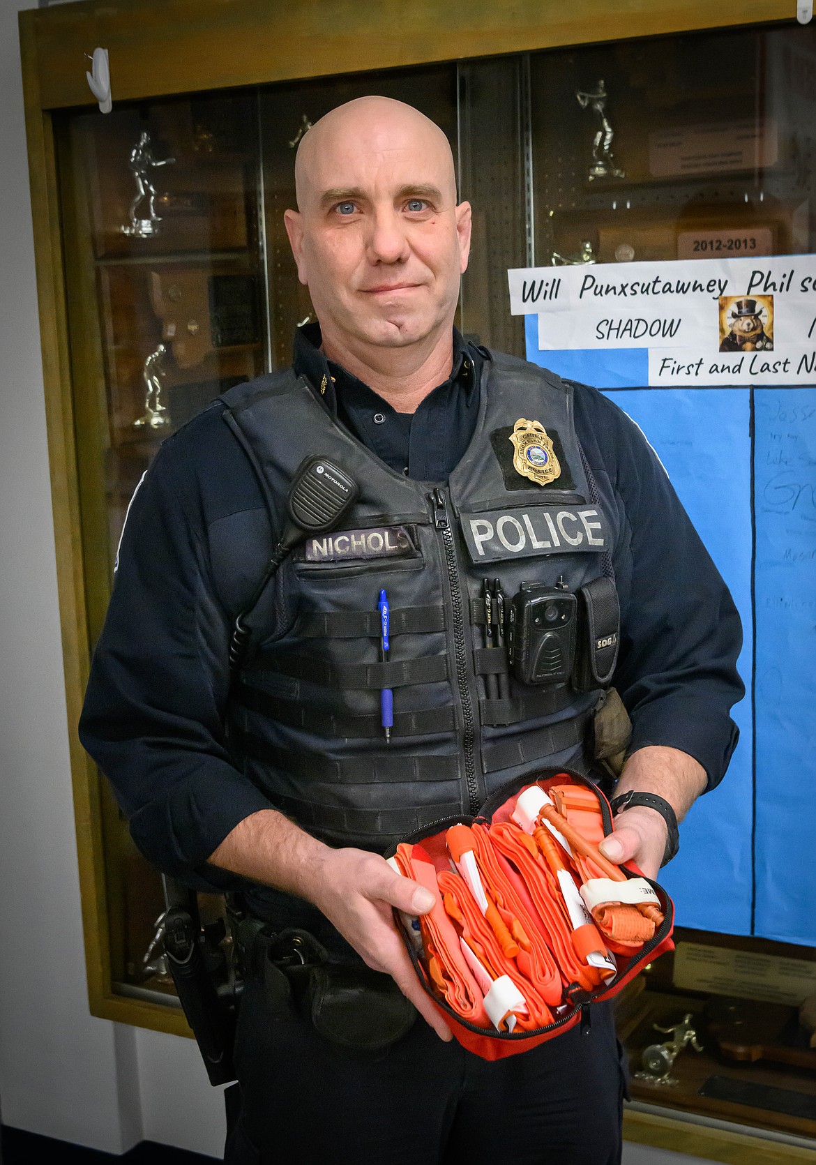 Thompson Falls Police Chief Christopher Nichols demonstrates emergency equipment at Thompson Falls High School. (Tracy Scott/Valley Press)