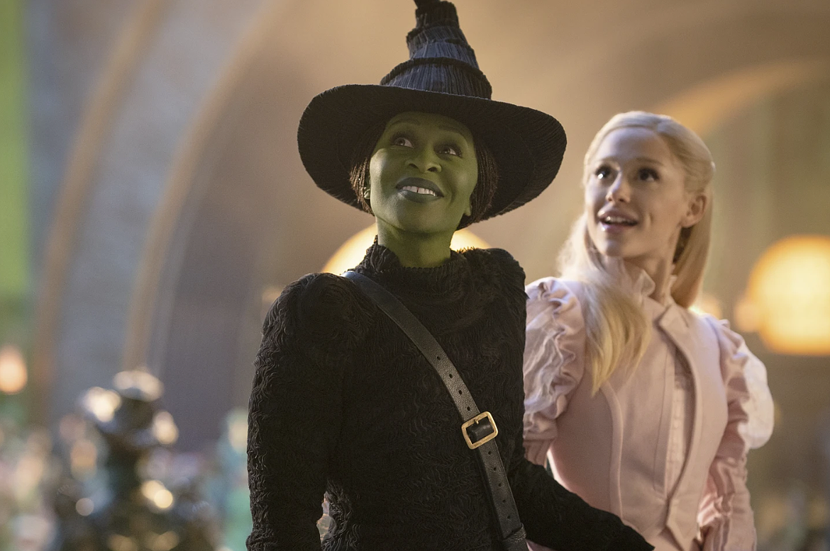 This image released by Universal Pictures shows Cynthia Erivo, left, and Ariana Grande in a scene from the film "Wicked."