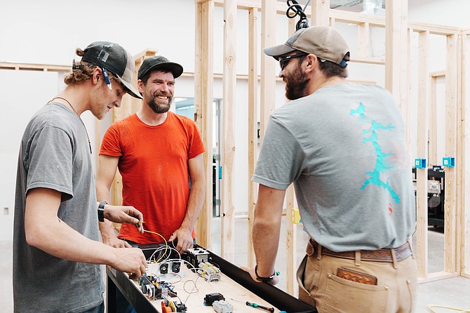 North Idaho College Workforce Training Electrical Apprenticeship students work in the lab as part of the hours of classroom instruction required for apprentices to receive their journeyman’s card.