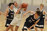 PREP BASKETBALL: Post Falls' loss is Lake City's gain ... Timberwolves take IEL title, top seed to 6A District 1 tournament