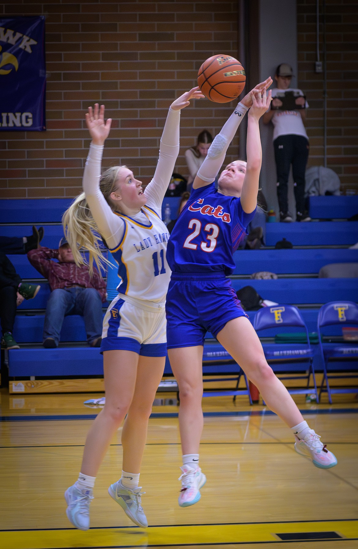 Thompson Falls junior Gabi Hannum goes airborne to break up a Superior Lady Bobcats' pass during their game Saturday in Thompson Falls.  (Tracy Scott, Valley Press)