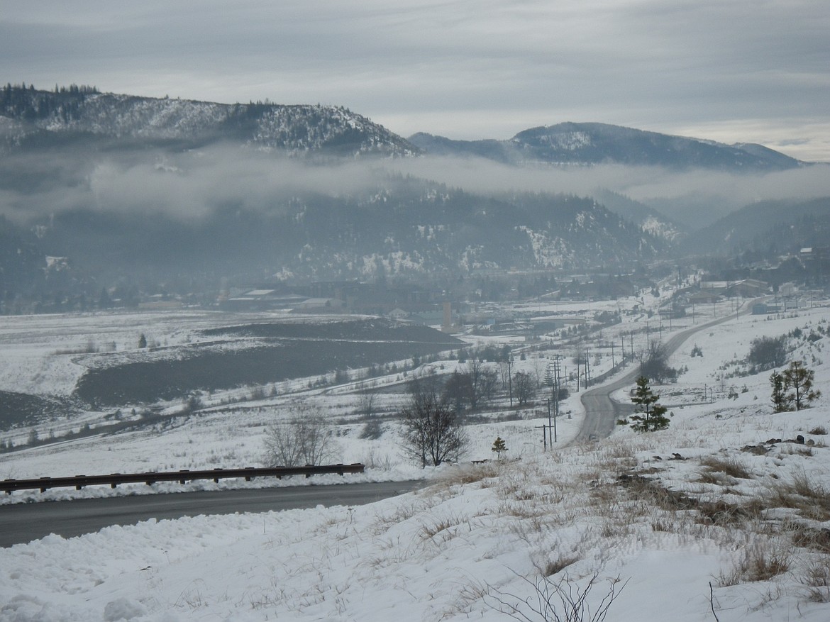 A haze of wood smoke and other particulate matter hangs around the mountains surrounding Kellogg.