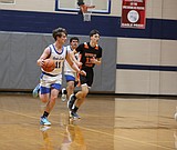 BASIN HOOPS ROUNDUP: Some teams advance, some go home in district basketball