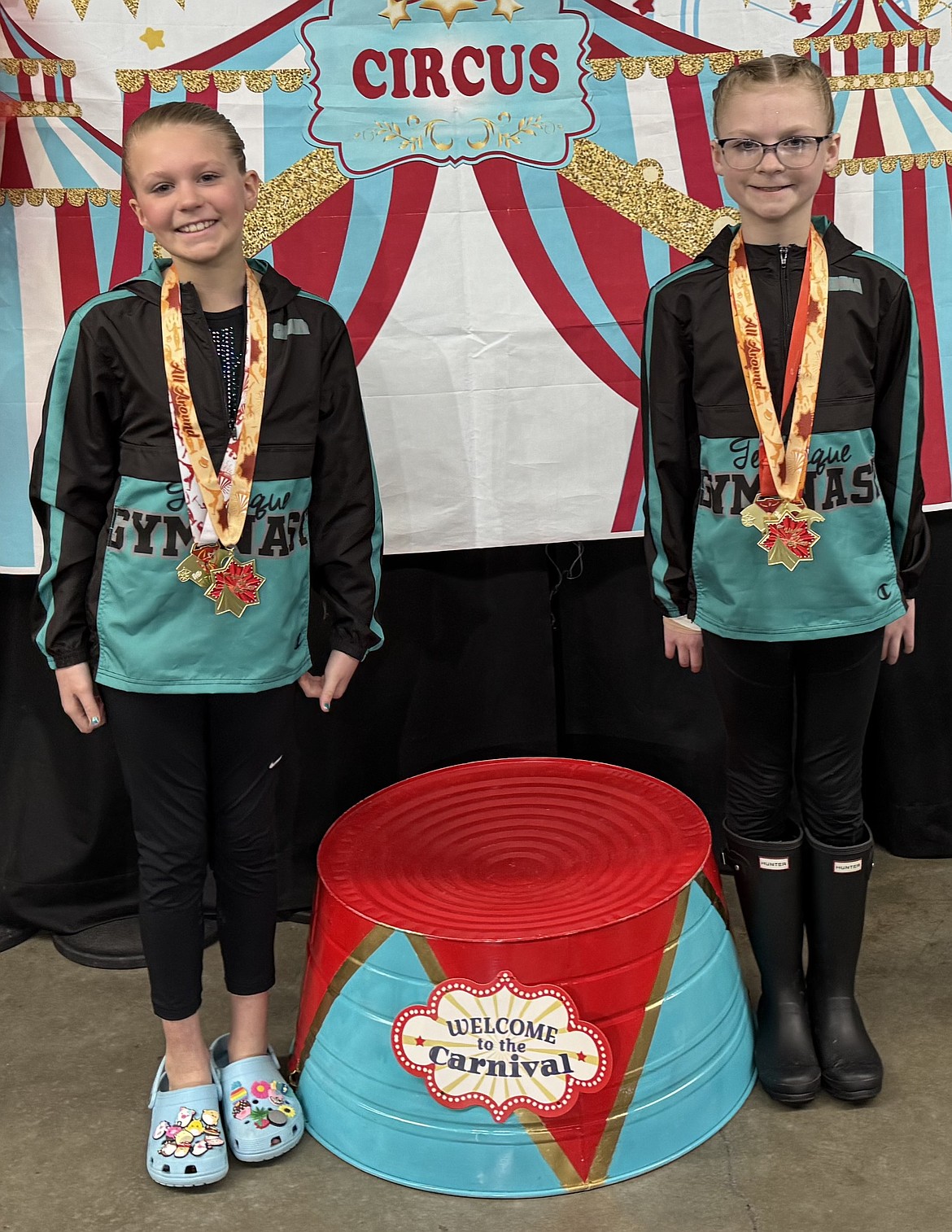 Courtesy photo
Technique Gymnastics Xcel Bronzes receiving awards at Under The Big Top in Boise. From left are Caroline Buffum and Jenna Morrison.