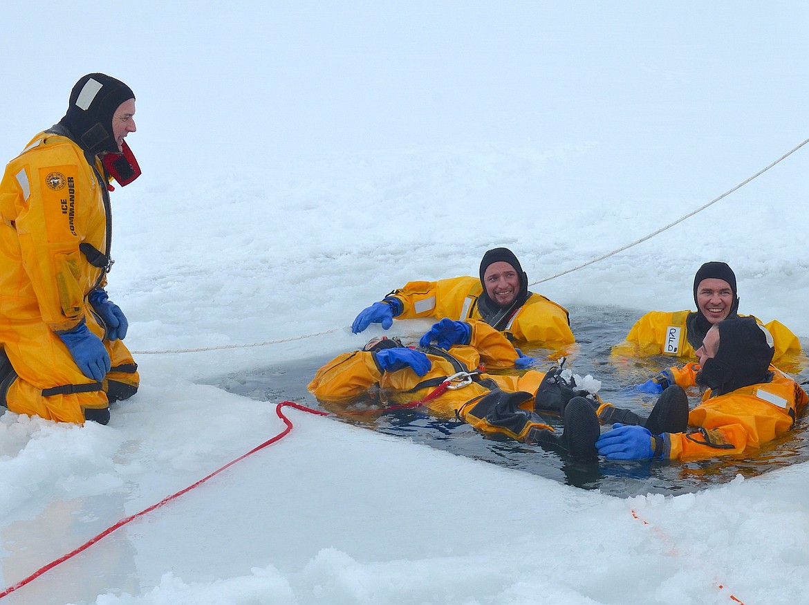 The editor, blissfully bobbing and safely harnessed during Saturday's ice-rescue training on Flathead Lake. (Adam Reed photo)
