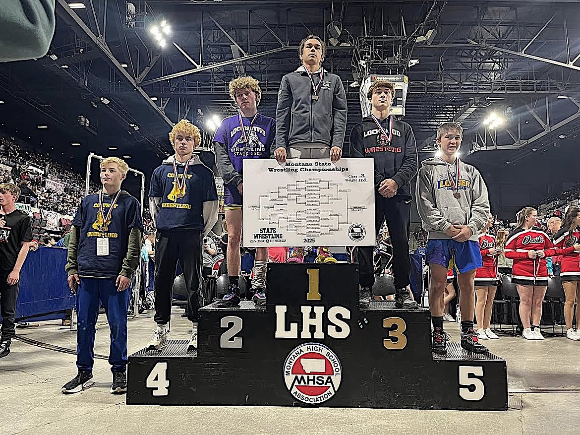Libby Greenchain wrestler Riley Orr, far right, shows off his medal Saturday, Feb. 15, 2025, for placing fifth in the 118-pound weight class at the Montana High School Association Class A Championships at MetraPark in Billings. (Photo courtesy Don Madison)