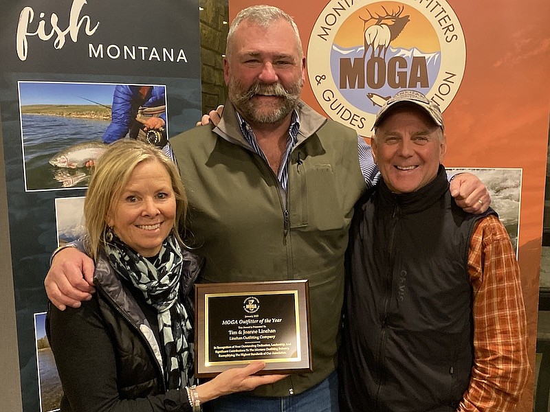 Joanne and Tim Linehan, owners of Linehan Outfitting, were recognized by the Montana Outfitters and Guides Association as the annual Outfitter of the Year at the association’s 50th anniversary convention. From left, are Joanne Linehan, Montana Outfitters and Guides Association President Chris Francis and Tim Linehan. (Courtesy photo)