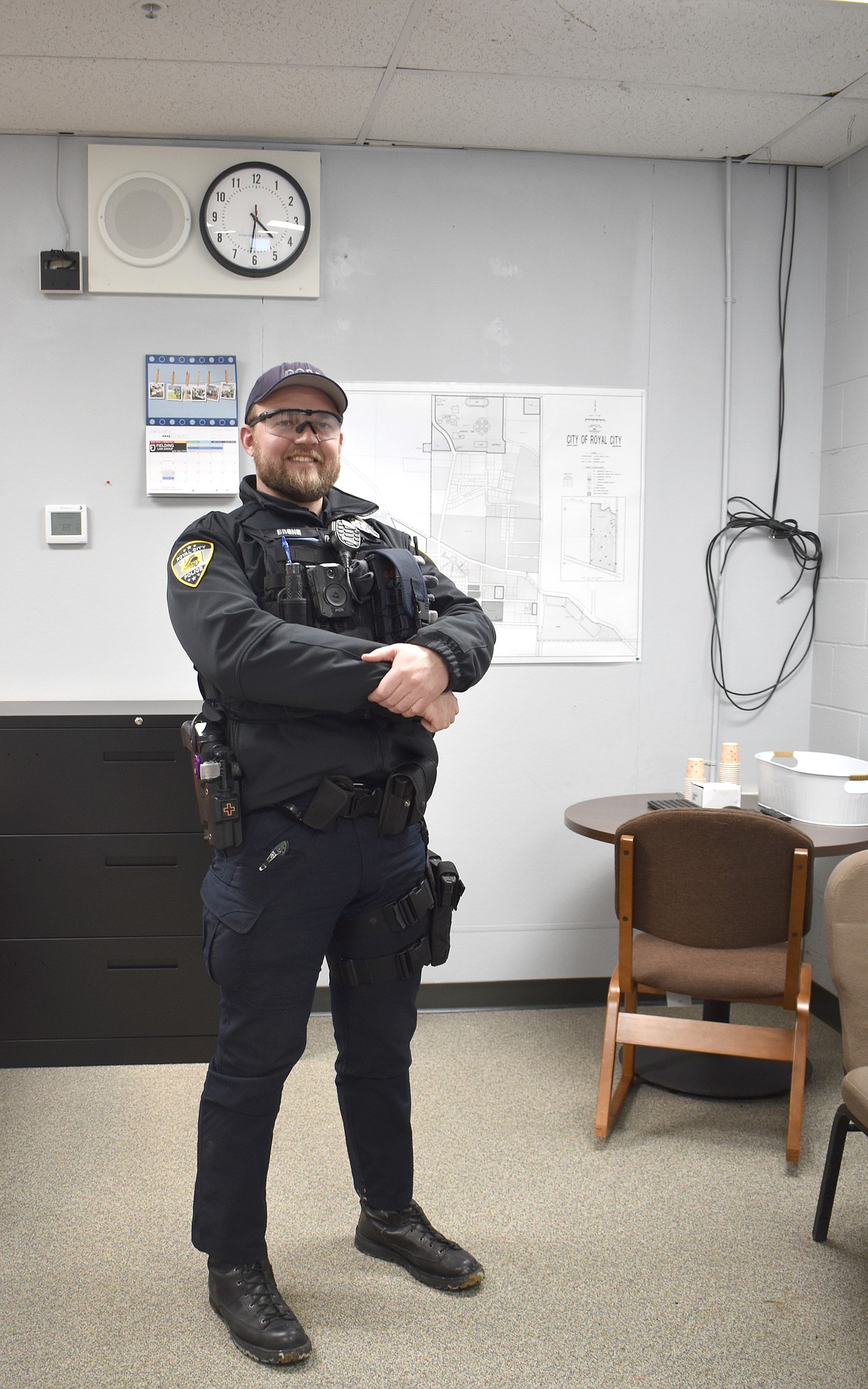 Royal City Police Officer Josh Bronn stands in his office at Royal High School. As the district’s school resource officer, Bronn maintains safety, but more importantly he enables students to have a relationship with the police that’s based on trust rather than fear.