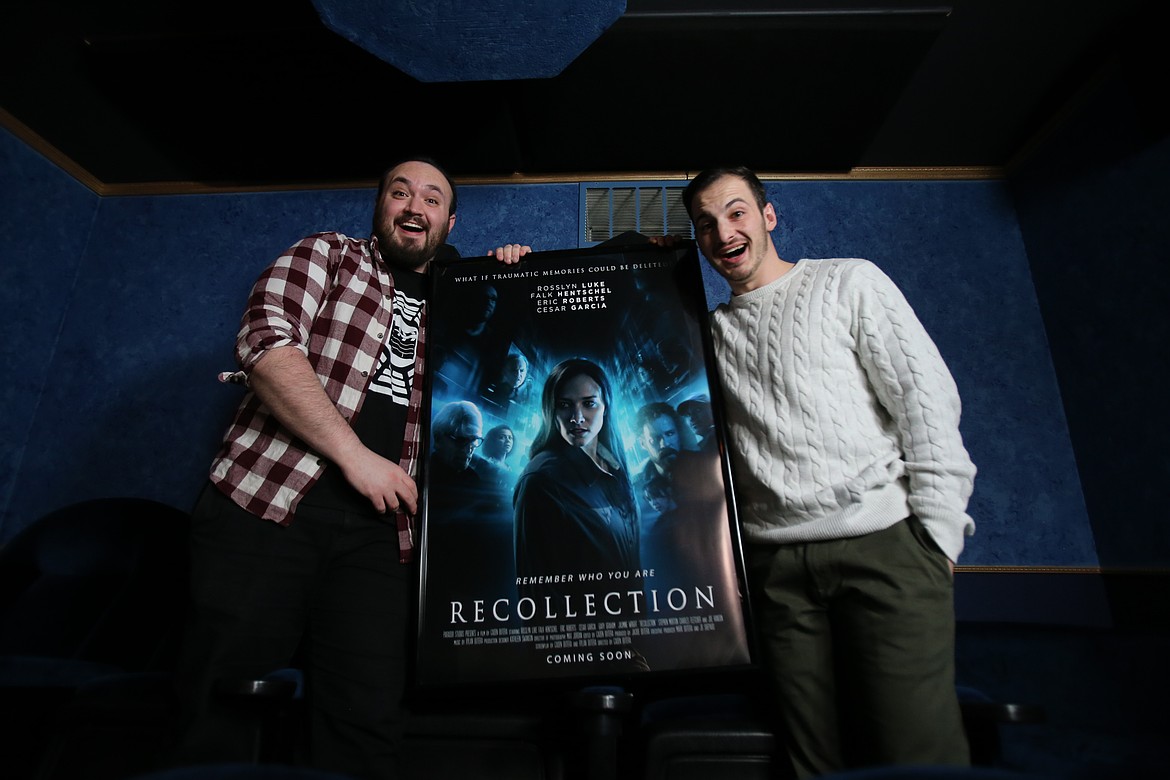 Butera brothers Caden, left, and Rylan are seen Feb. 14 with the poster for their film, "Recollection," which premieres at 7 p.m. March 7 at the Spokane International Film Festival.
