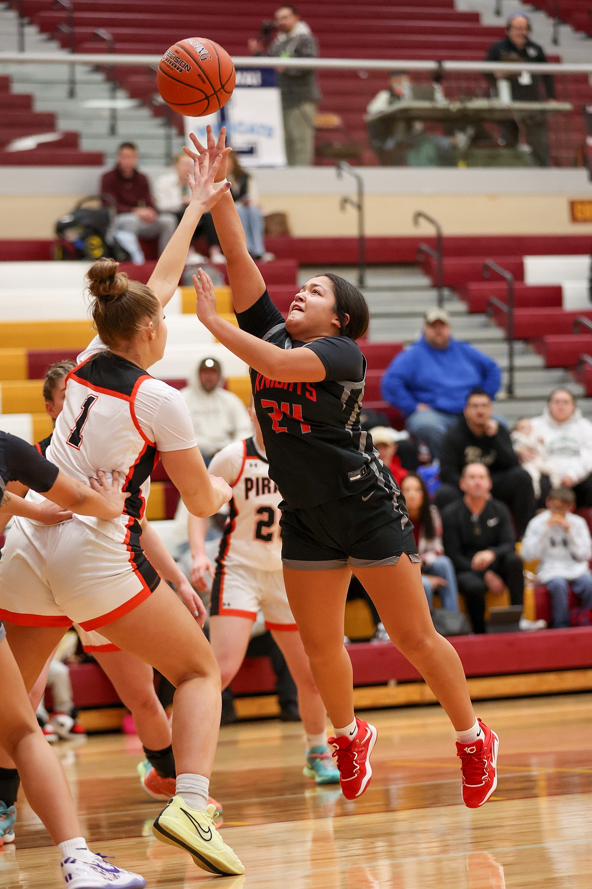JASON DUCHOW PHOTOGRAPHY
Lakeside's Tylah Lambert puts up a shot as Butte County's Addison Pancheri defends during the first half of Saturday's state 2A girls basketball consolation championship game at Columbia High in Nampa.