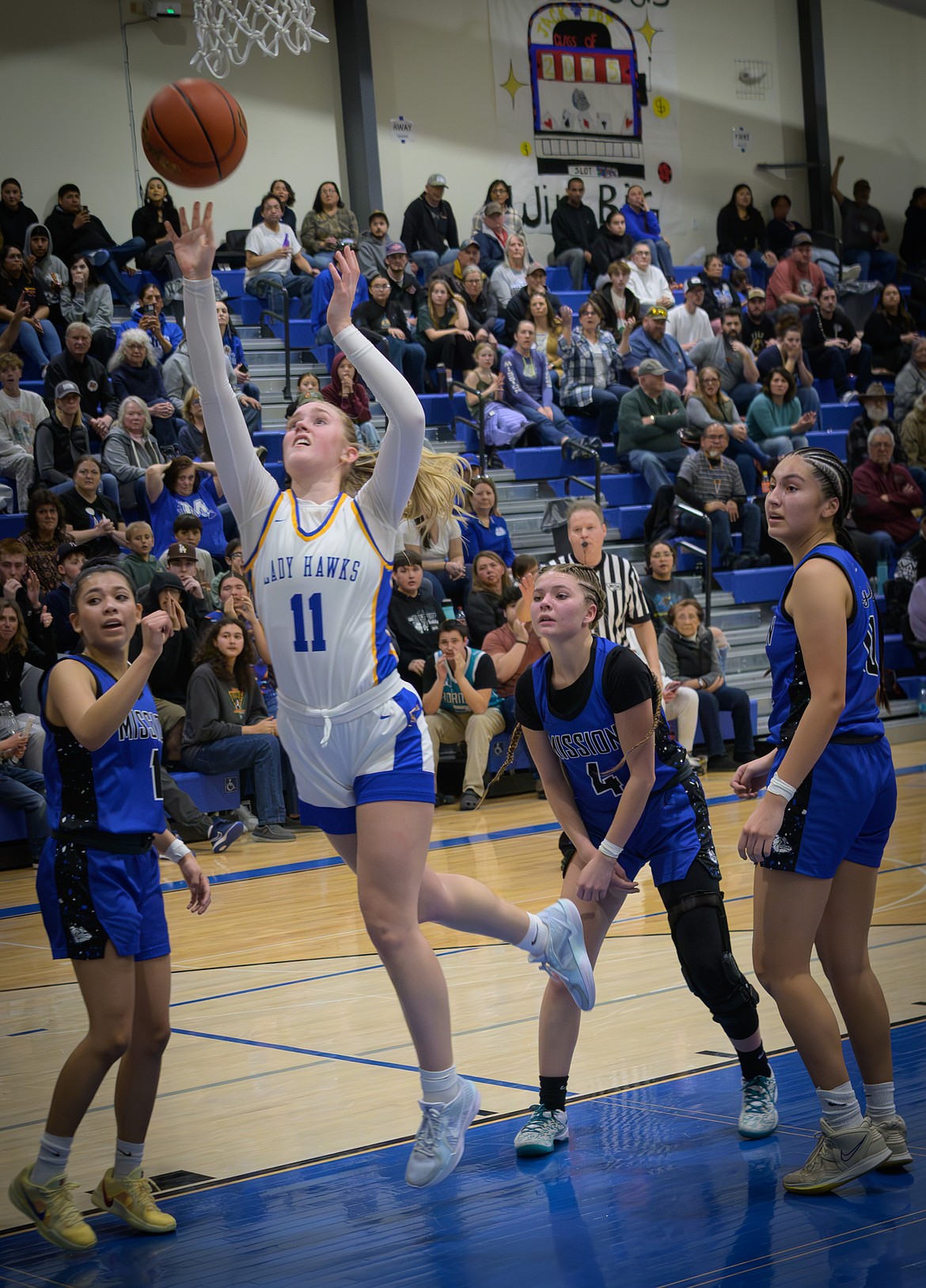 T Falls junior Gabit Hannum goes up for two during the Lady Hawks game in this past week's District 7B playoff tourney versus Mission.  (Tracy Scott, Valley Press)