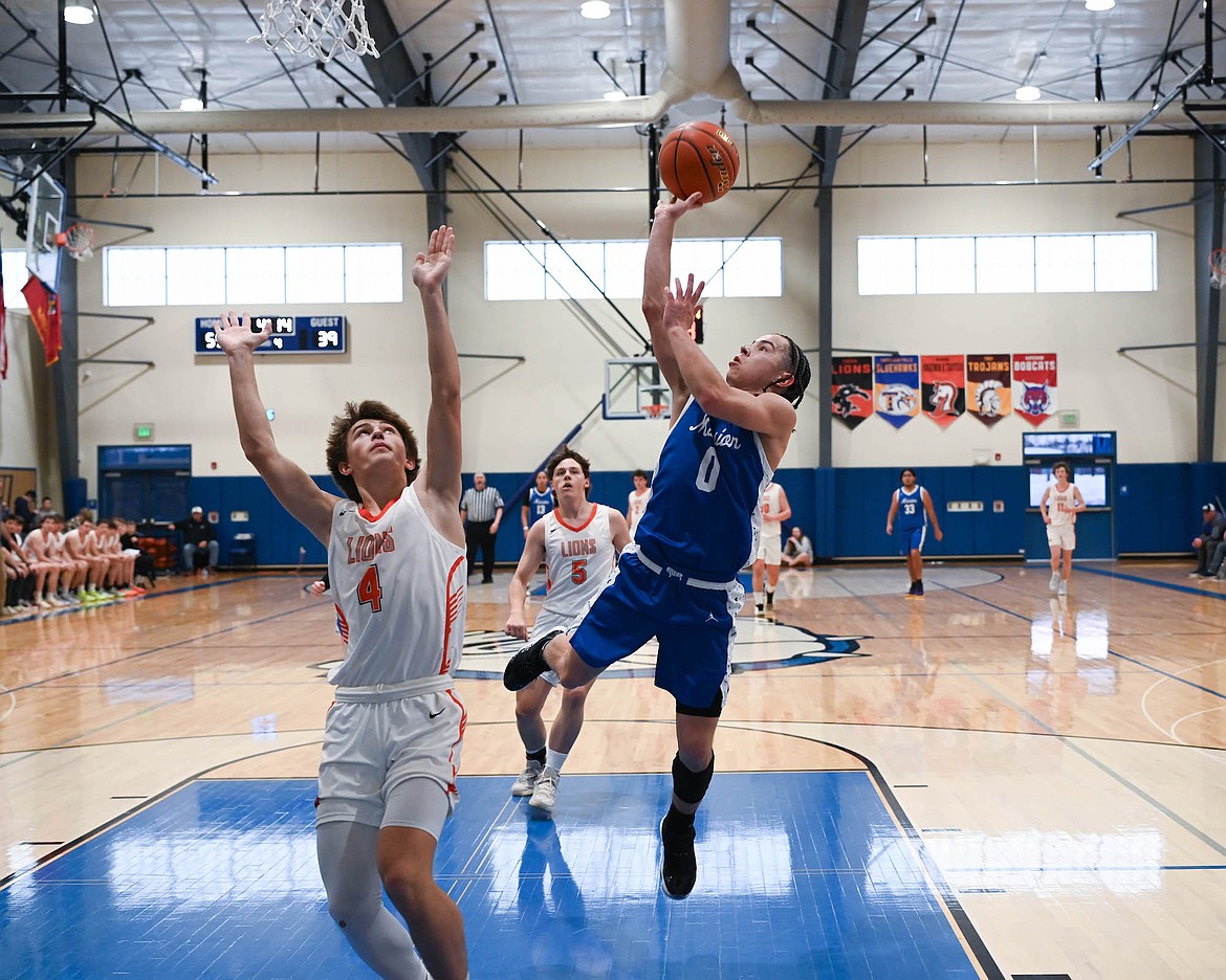 Lex LaFrombois takes a shot against the Eureka Lions during the District 7B tournament, which saw the Mission athlete surpass the 1,000-point mark. (Christa Umphrey photo)