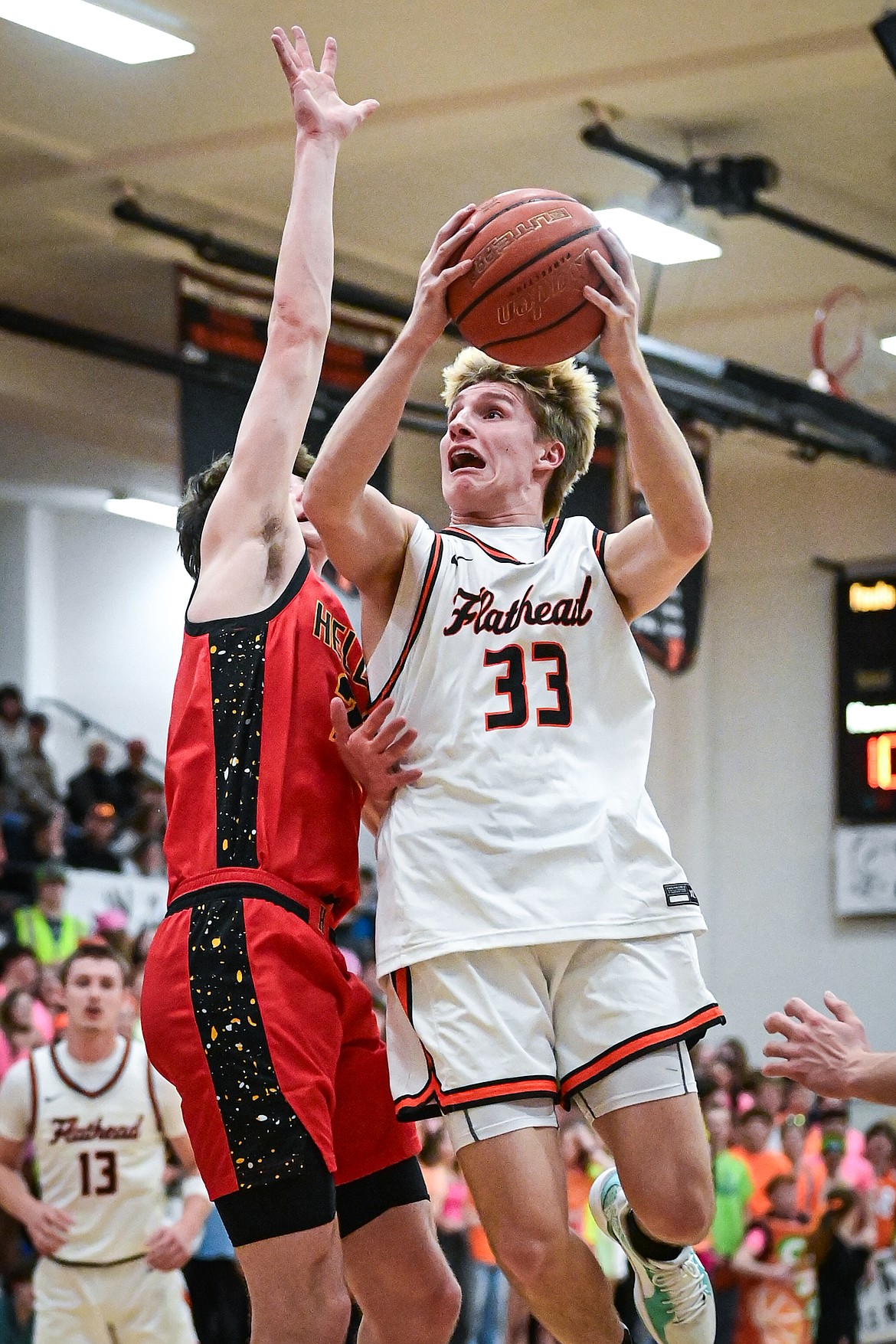 Flathead's Korbin Eaton (33) drives to the basket in the first half against Missoula Hellgate at Flathead High School on Thursday, Feb. 27. (Casey Kreider/Daily Inter Lake)