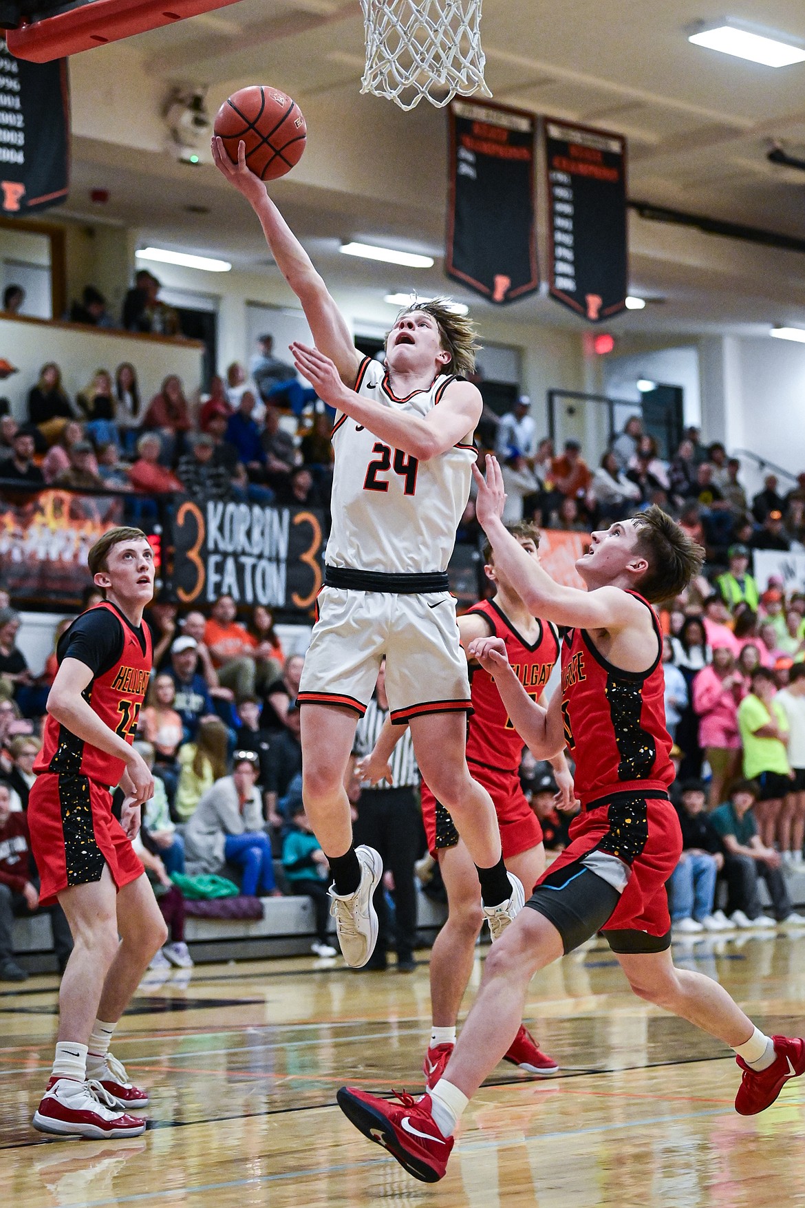 Flathead's Brodee Zahn (24) drives to the basket in the first half against Missoula Hellgate at Flathead High School on Thursday, Feb. 27. (Casey Kreider/Daily Inter Lake)