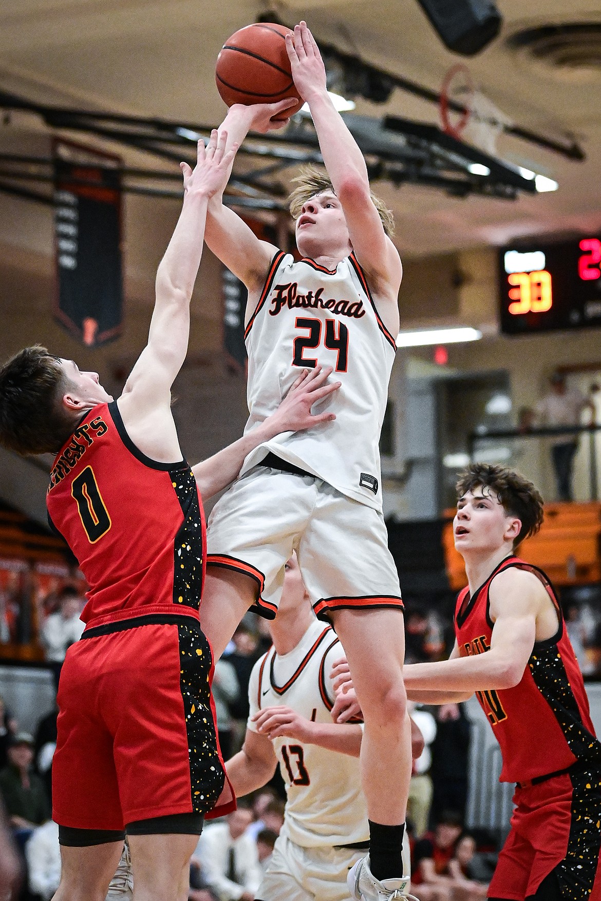 Flathead's Brodee Zahn (24) shoots in the fourth quarter against Missoula Hellgate at Flathead High School on Thursday, Feb. 27. (Casey Kreider/Daily Inter Lake)