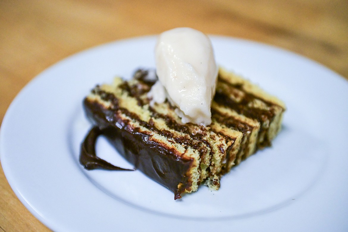 A slice of Smith Island Cake with Maple Cream served as dessert at a Chef's Table dinner series held by Flathead Valley Community College's Culinary Institue of Montana on Friday, Feb. 21. (Casey Kreider/Daily Inter Lake)