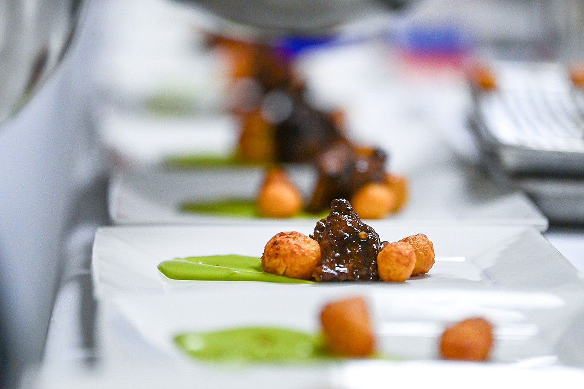 Sirloin Beef Steak Tips served with a glace de viande, potatoes dauphine and spinach foam at a Chef's Table dinner series held by Flathead Valley Community College's Culinary Institue of Montana on Friday, Feb. 21. (Casey Kreider/Daily Inter Lake)
