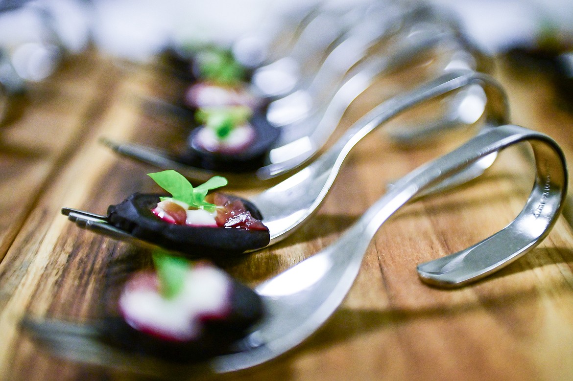 Beet carpaccio with horseradish yogurt, candied red onion and watercress served as an amuse-bouche at a Chef's Table dinner series held by Flathead Valley Community College's Culinary Institue of Montana on Friday, Feb. 21. (Casey Kreider/Daily Inter Lake)