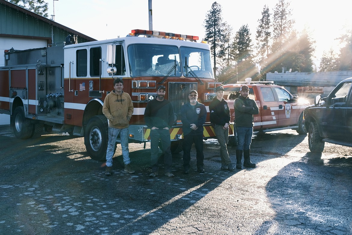 North Bench Fire District firefighters pose in front of the newly acquired 1998 Sutphen fire engine.