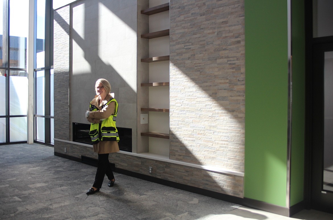 Quincy Valley Medical Center Chief Executive Officer Glenda Bishop stands in the front lobby of the new hospital.
