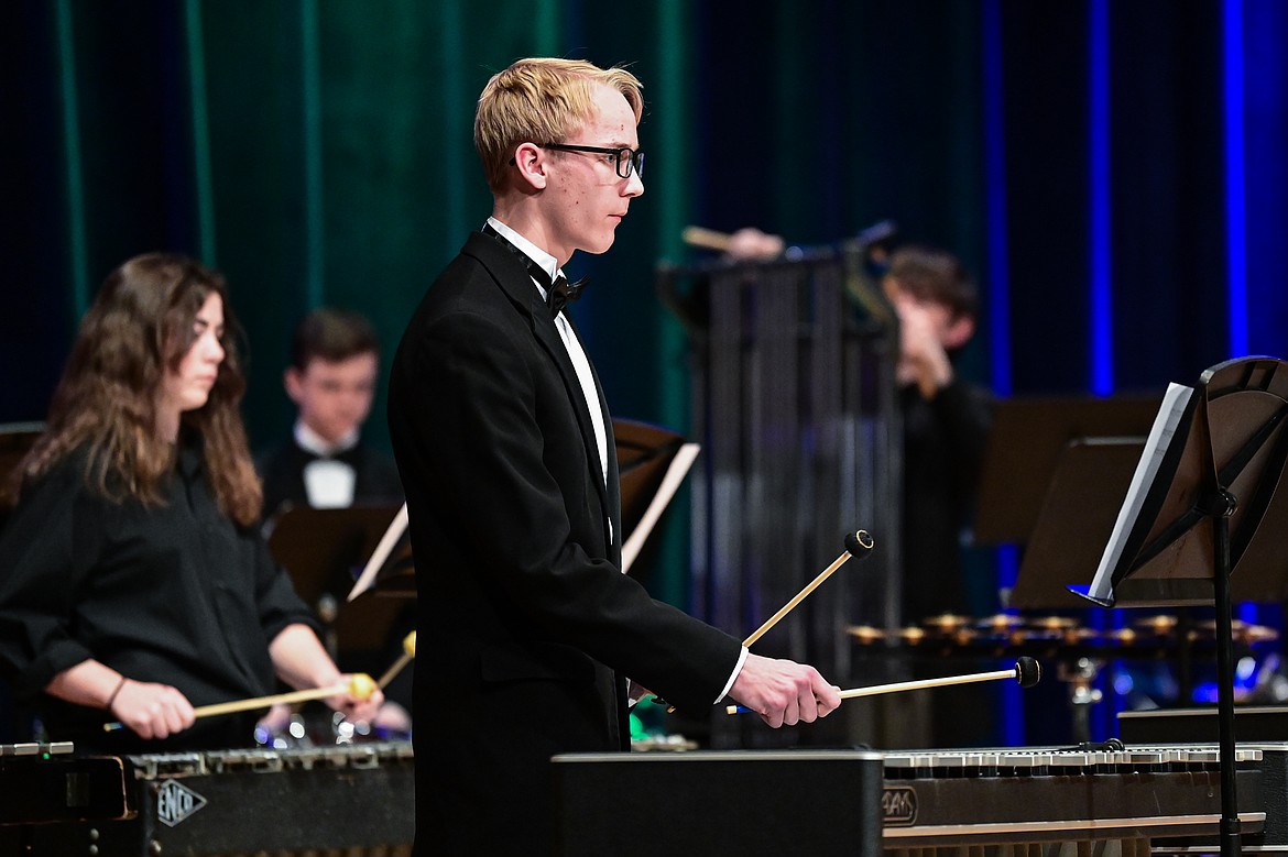 Members of the combined percussion ensemble from Flathead, Glacier, Bozeman and Helena high schools perform at the MHSA AA Band Festival at Glacier High School on Tuesday, March 4. (Casey Kreider/Daily Inter Lake)