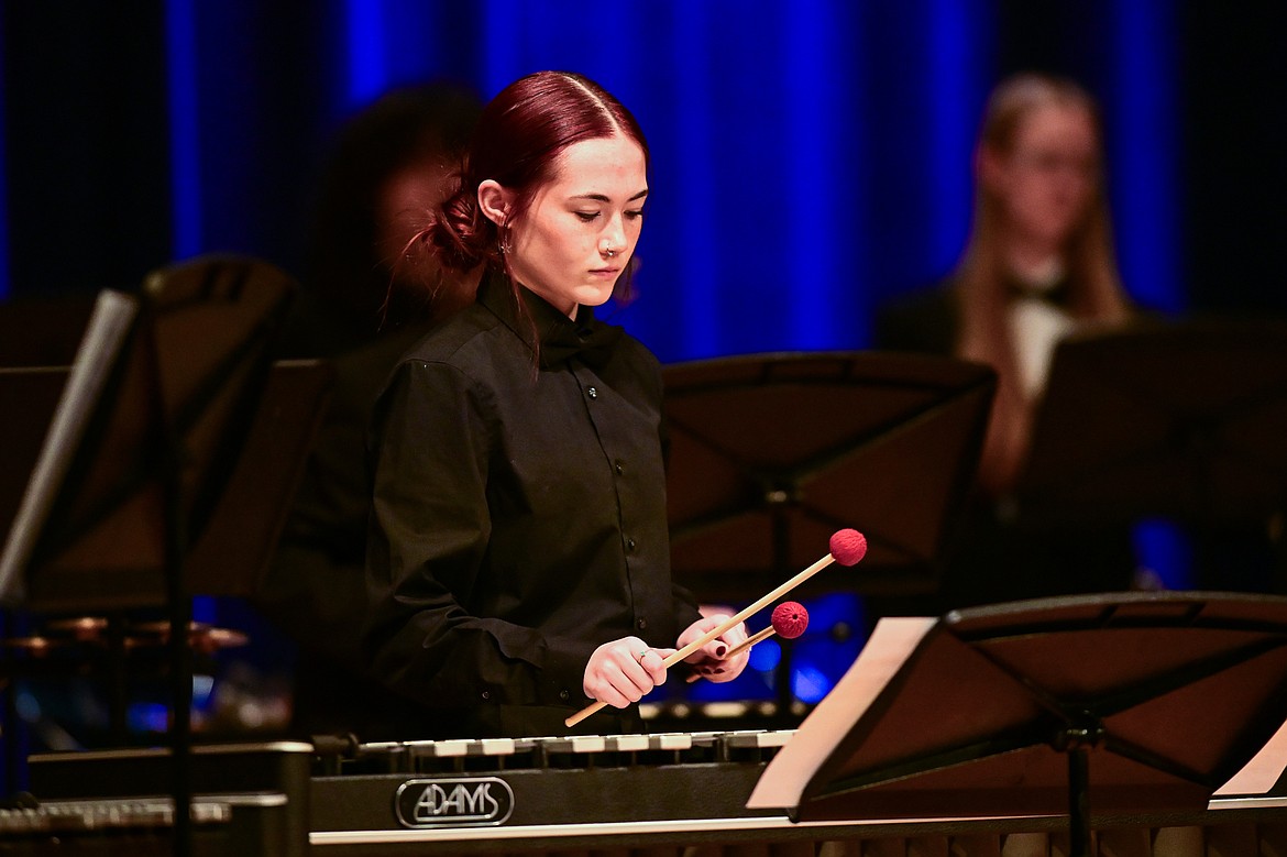 Members of the combined percussion ensemble from Flathead, Glacier, Bozeman and Helena high schools perform at the MHSA AA Band Festival at Glacier High School on Tuesday, March 4. (Casey Kreider/Daily Inter Lake)