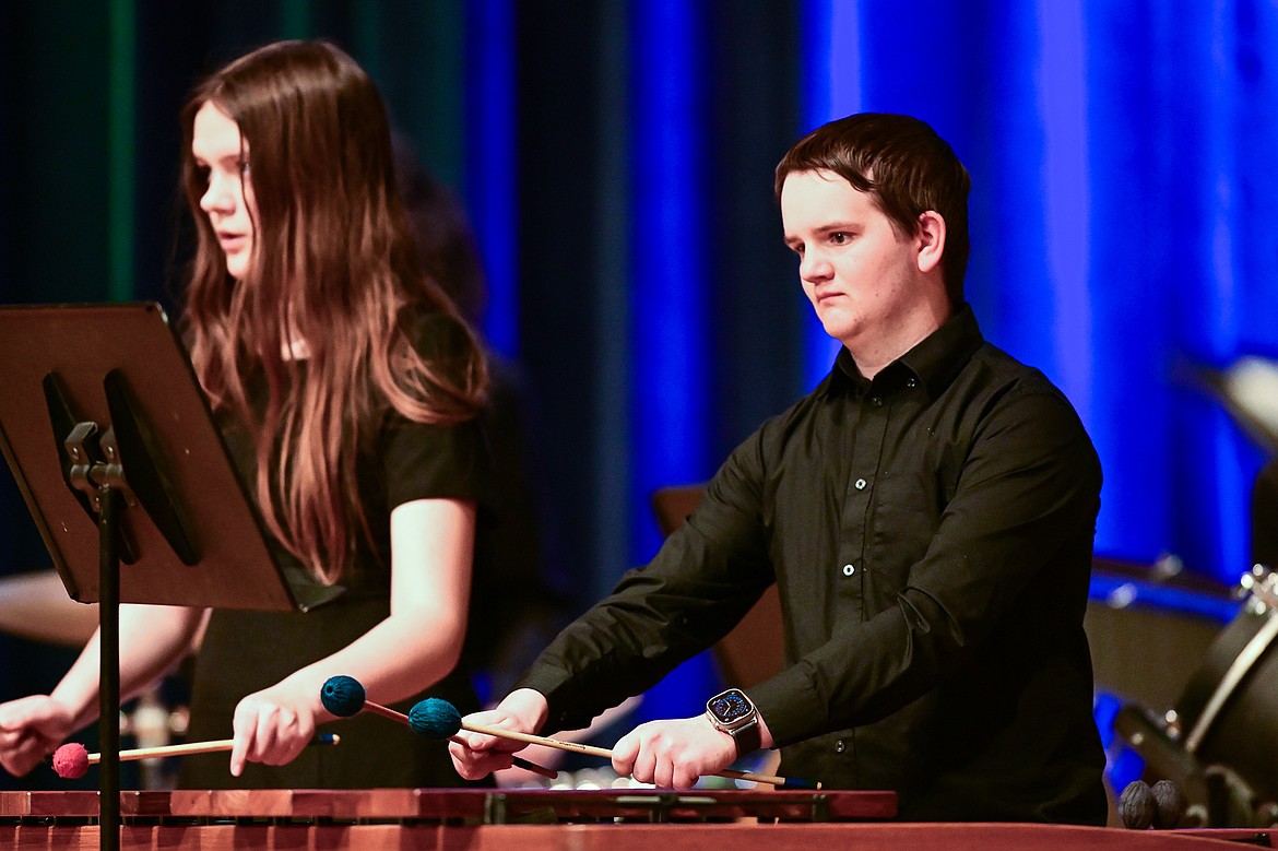 Members of the combined percussion ensemble from Flathead, Glacier, Bozeman and Helena high schools perform at the MHSA AA Band Festival at Glacier High School on Tuesday, March 4. (Casey Kreider/Daily Inter Lake)