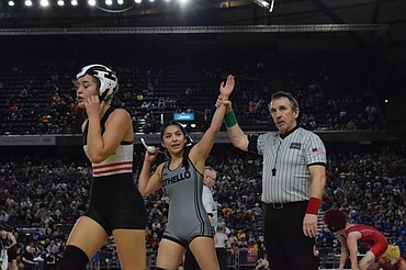 Briseida Galvez, 120 from Othello wrestles against Petra Sheppard of Chief Sealth. Galvez won the bout with a pin in 3:57. She placed sixth in the tournament with 17 team points.