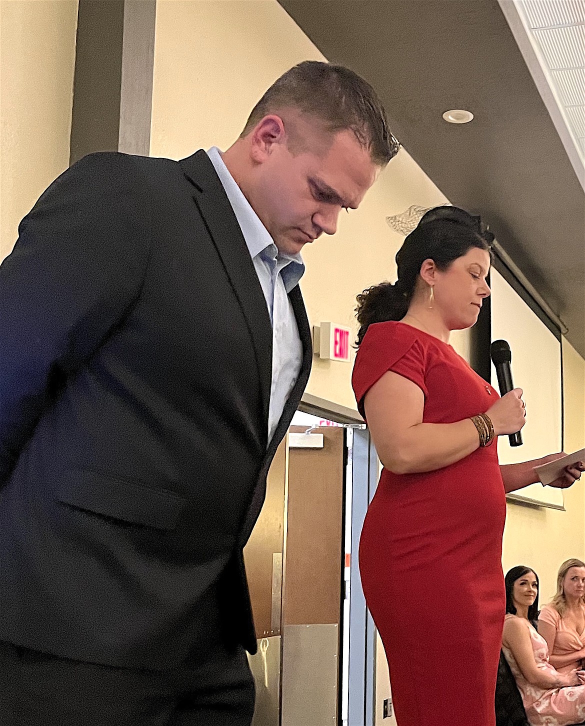 Brian Miskimins listens as Chamber President Joslyn Shackelford enumerates his qualifications for the Citizen of the Year title during the Polson Chamber of Commerce banquet. (Kristi Niemeyer/Leader)