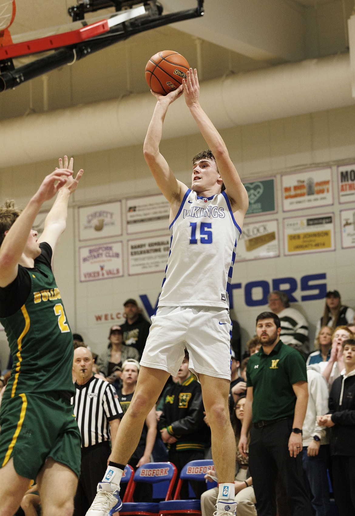 Austin Savik scores for the Vikings playing Whitefish Thursday, Feb. 27. (Courtesy/Steve Mitchell)