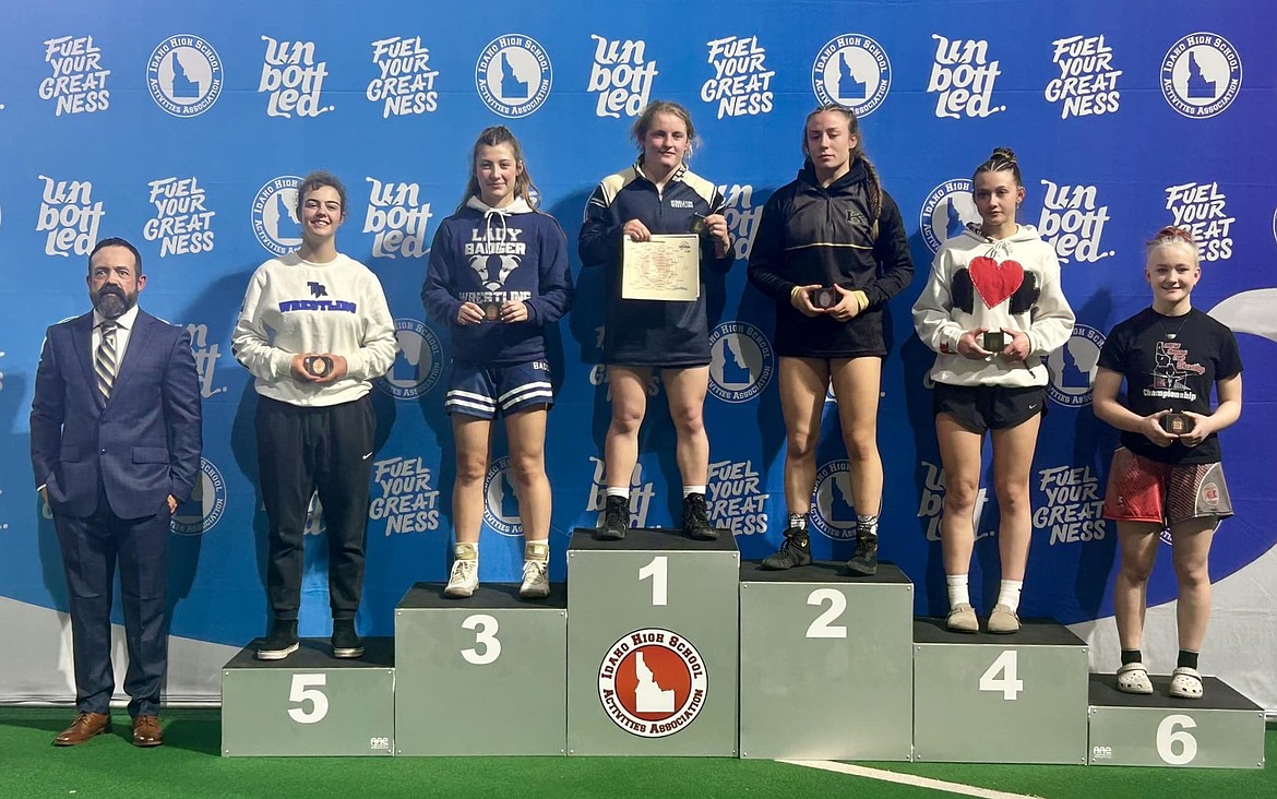 Bonners Ferry High senior Sofia Brown, third from left, shows off the bronze medal she earned in the 138-pound weight class at the All-Class State Championship held Friday and Saturday at the ICCU Dome in Pocatello.