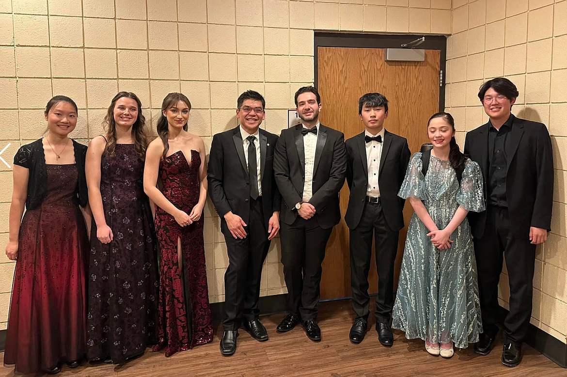 Coeur d'Alene Symphony Orchestra's 2024 Young Artist Competition winners are pictured with Conductor Danh Pham, fourth from left. The Coeur d'Alene Symphony Orchestra will present the Young Artist Concert at 7:30 p.m. March 22 in the Schuler Performing Arts Center at North Idaho College.