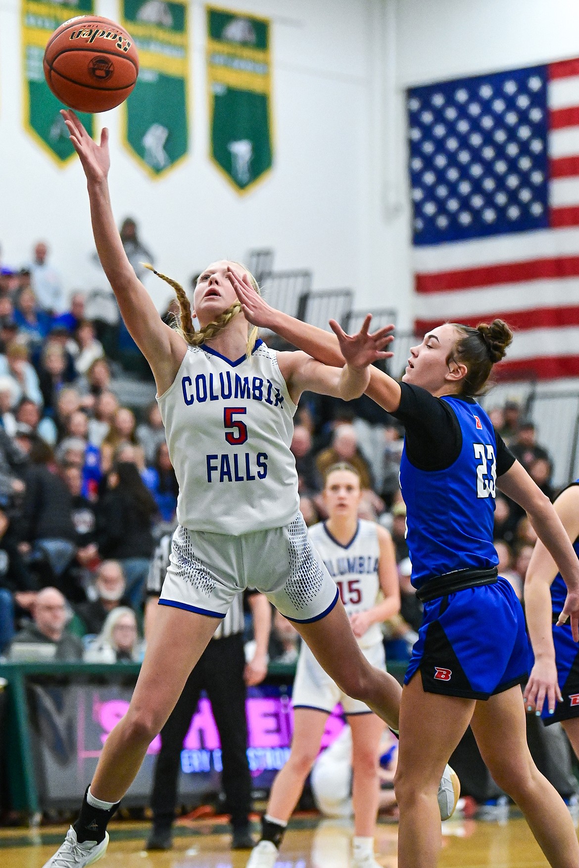 Columbia Falls' Onnikka Lawrence (5) drives to the basket in the first half against Bigfork in the consolation game of the Western A Divisional Basketball Tournament at Whitefish High School on Saturday, March 8. (Casey Kreider/Daily Inter Lake)