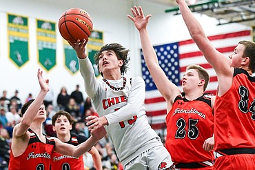 Ronan's Sean Small (13) drives to the basket in the first half against Frenchtown in the consolation game of the Western A Divisional Basketball Tournament at Whitefish High School on Saturday, March 8. (Casey Kreider/Daily Inter Lake)