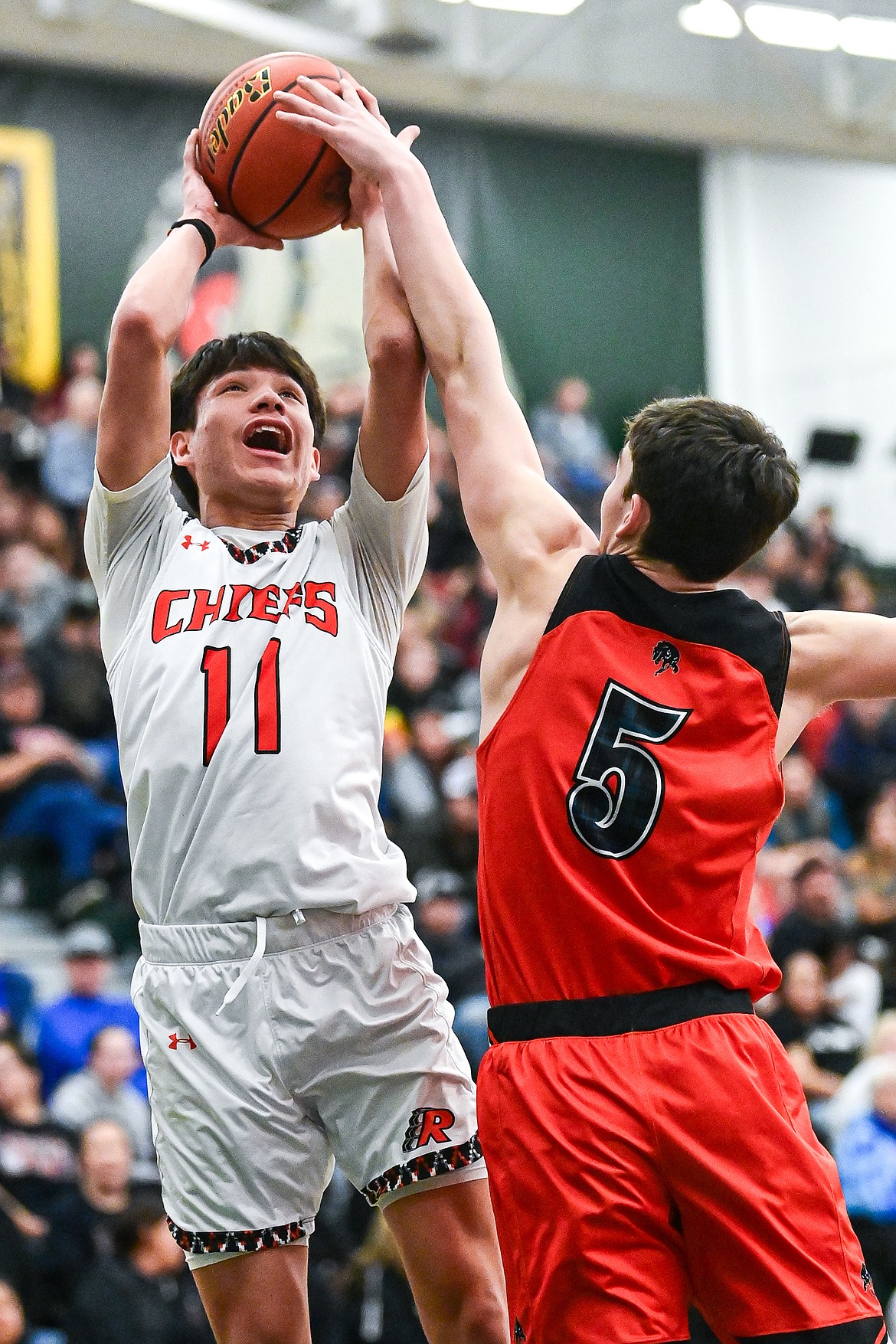 Ronan's Wade Qualtier (11) shoots in the second half against Frenchtown in the consolation game of the Western A Divisional Basketball Tournament at Whitefish High School on Saturday, March 8. (Casey Kreider/Daily Inter Lake)