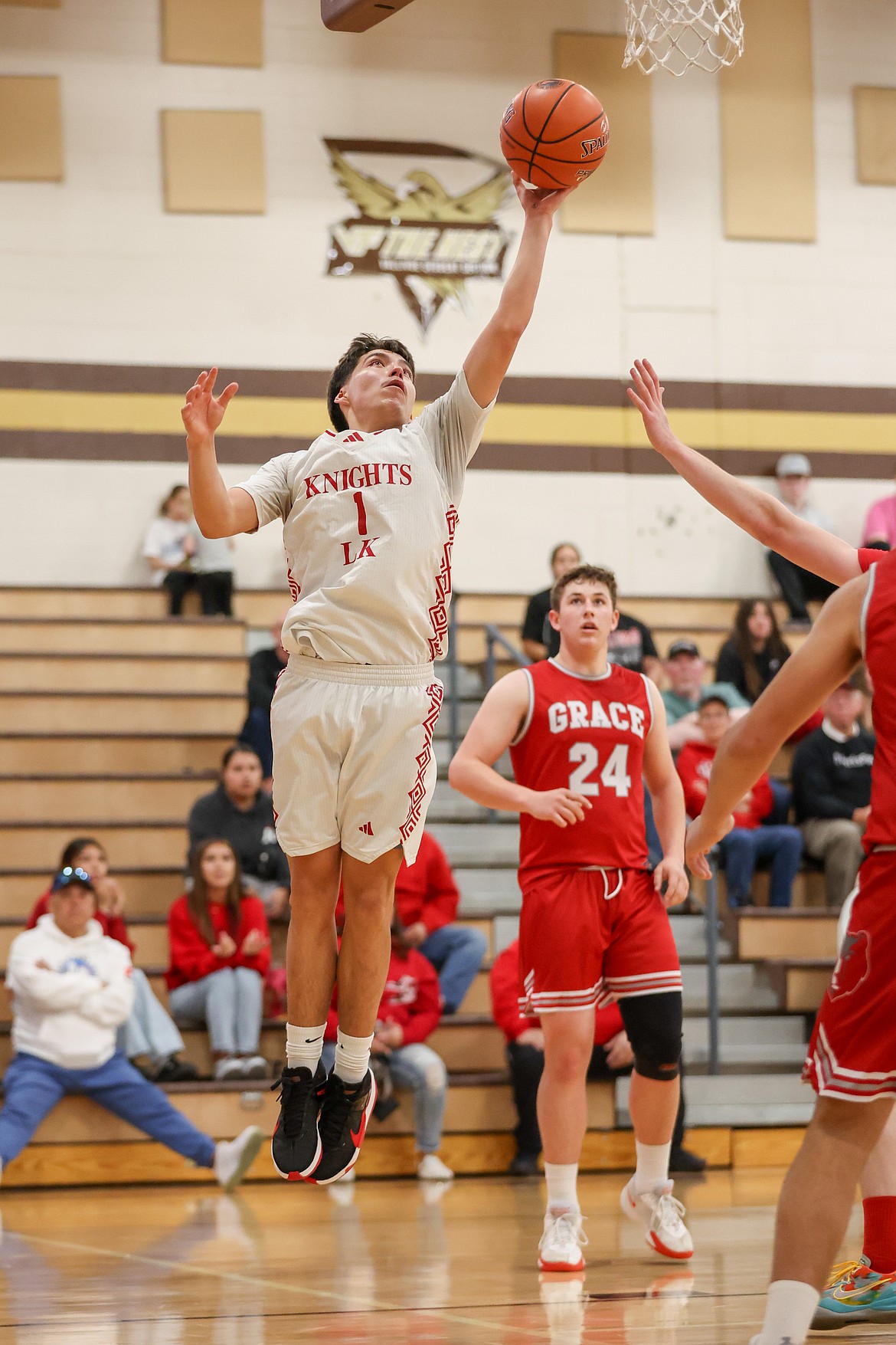 JASON DUCHOW PHOTOGRAPHY
Lakeside junior Hallah Peone drives through the Grace defense during Saturday's state 2A boys basketball third-place game at Vallivue High in Caldwell.