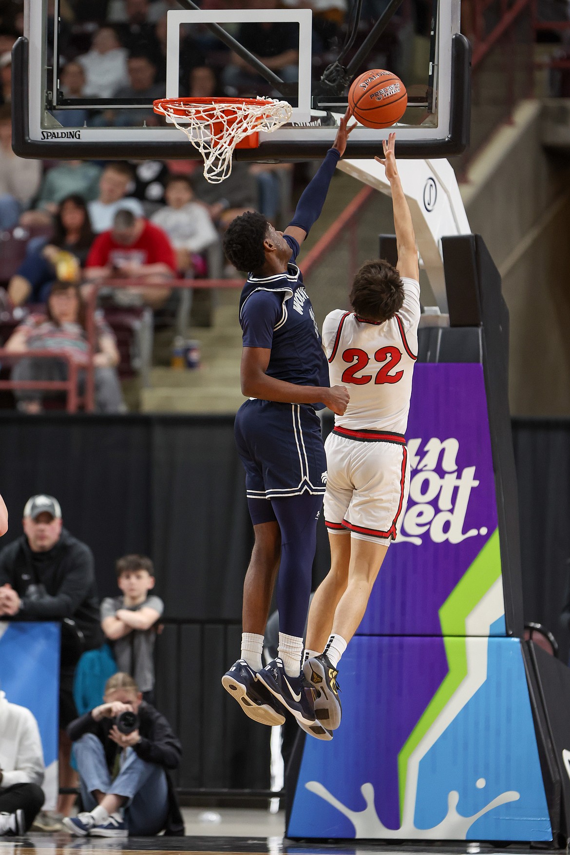 JASON DUCHOW PHOTOGRAPHY
Lake City junior Josh Watson (11) blocks a shot by Jayce Allen (22) of Owyhee in the state 6A boys championship game Saturday night at the Ford Idaho Center in Nampa.