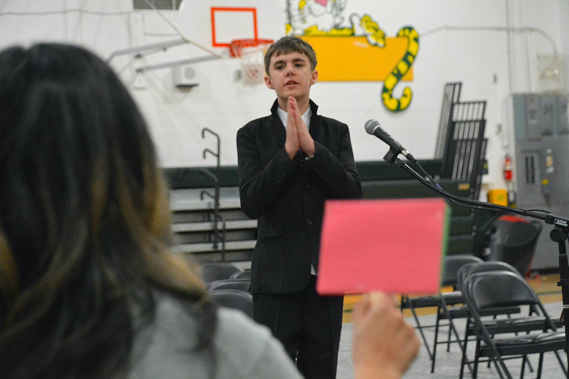 Shepherd Miller, a sixth grader from St. Regis School, clasped his hands together, hoping to see the judge's green sign, signaling a correct spelling. His winning word was prototypes. Contestants from Alberton, Superior, and St. Regis went several rounds Tuesday evening, on March 4, during the Mineral County Spelling Bee. Miller, along with the state's other top spellers, will attend the Treasure State Spelling Bee on campus at Montana State University, slated for March 22. (Mineral Independent/Amy Quinlivan)